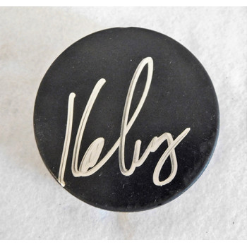 Keith Carney Signed Blank Hockey Puck JSA Authenticated